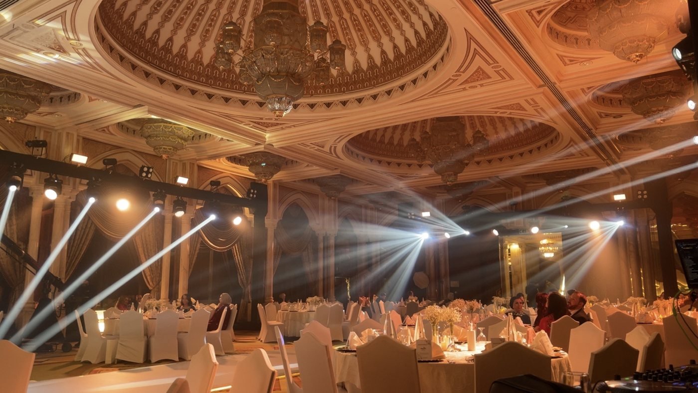 Warm beam lighting over the ballroom